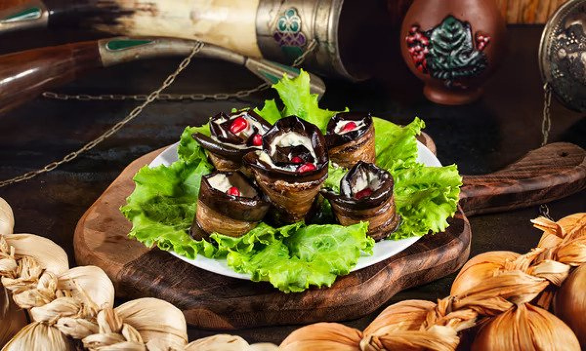 Eggplant with walnuts - Georgian dish at Tbilisuri Ezo restaurant in Tbilisi }}