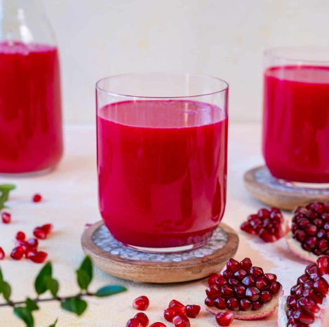 Fresh Juice pomegranate - Georgian dish at Tbilisuri Ezo restaurant in Tbilisi }}