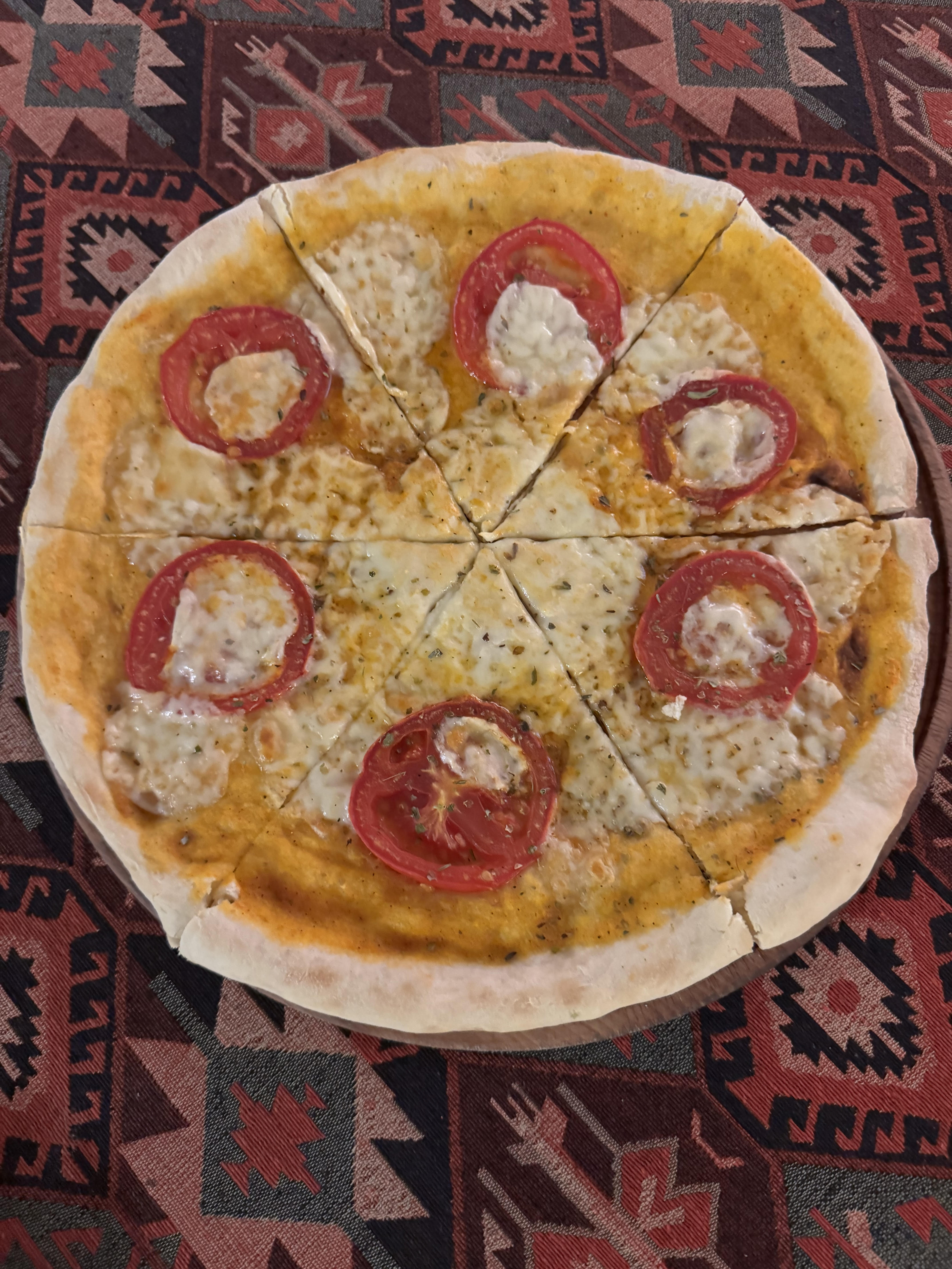 Pizza Margherita - Georgian dish at Tbilisuri Ezo restaurant in Tbilisi }}