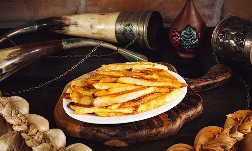 French Fries  Potatoes at Tbilisuri Ezo Georgian restaurant in Tbilisi }}