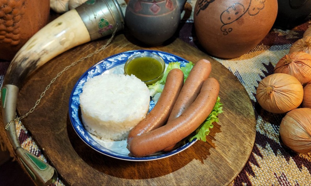 Sausage With Rice Garnish - Georgian dish at Tbilisuri Ezo restaurant in Tbilisi }}