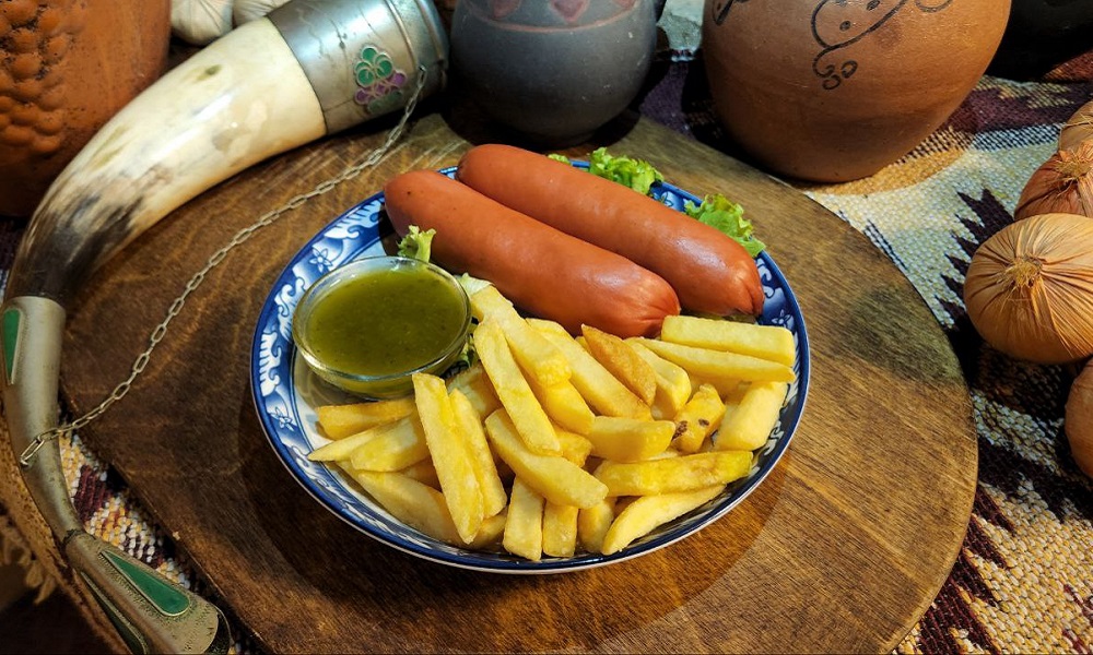 Sardel With Fry  Garnish - Georgian dish at Tbilisuri Ezo restaurant in Tbilisi }}