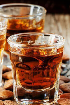 Amaretto liqueur (Cup 50 GR) - Georgian dish at Tbilisuri Ezo restaurant in Tbilisi }}