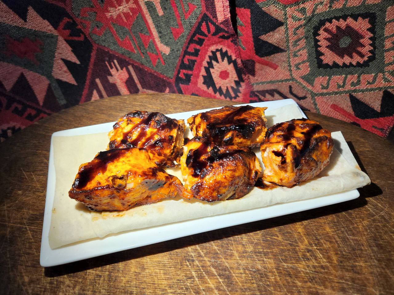 Chicken barbecue - Georgian dish at Tbilisuri Ezo restaurant in Tbilisi }}