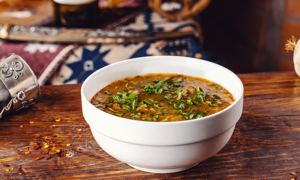 Soup Kharcho - Georgian dish at Tbilisuri Ezo restaurant in Tbilisi }}