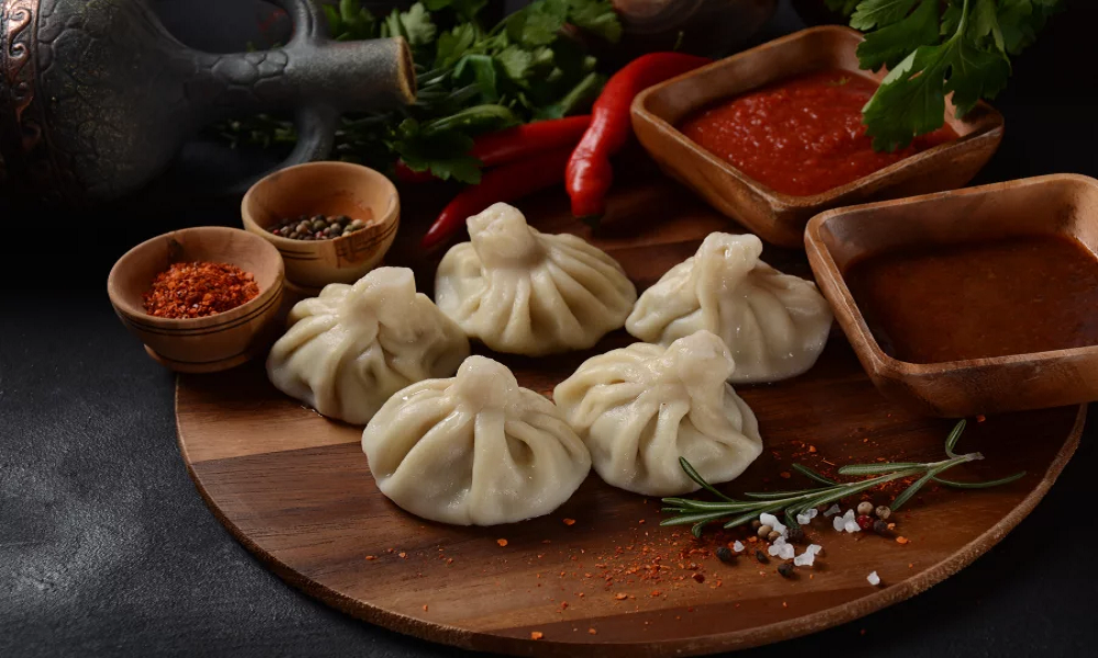Khinkali with cheese (1pic) - Georgian dish at Tbilisuri Ezo restaurant in Tbilisi }}
