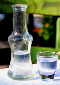 Chacha Kakhuri homemade 0.5 L - Georgian dish at Tbilisuri Ezo restaurant in Tbilisi }}
