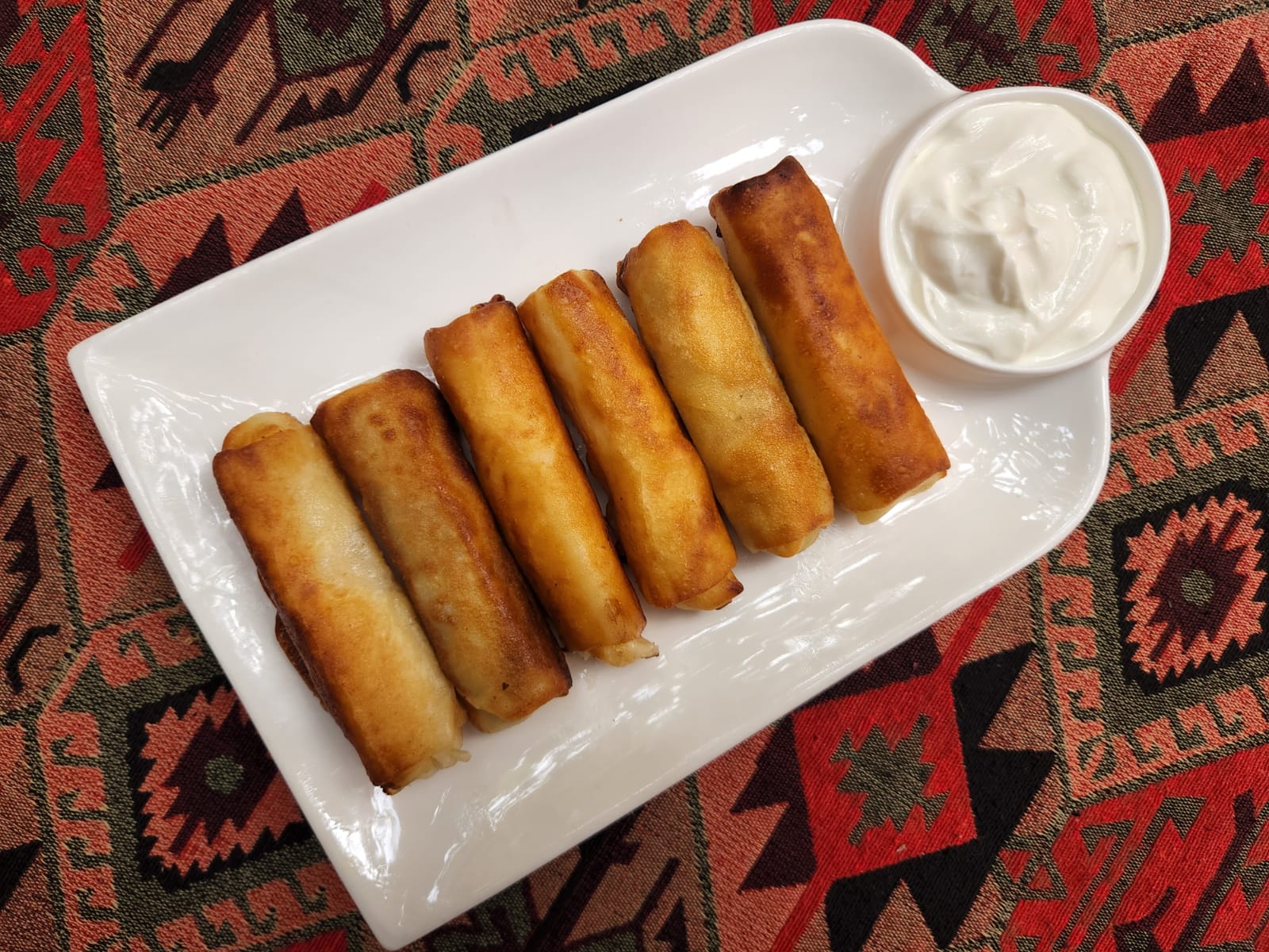 Pancakes with Cheese at Tbilisuri Ezo Georgian restaurant in Tbilisi }}