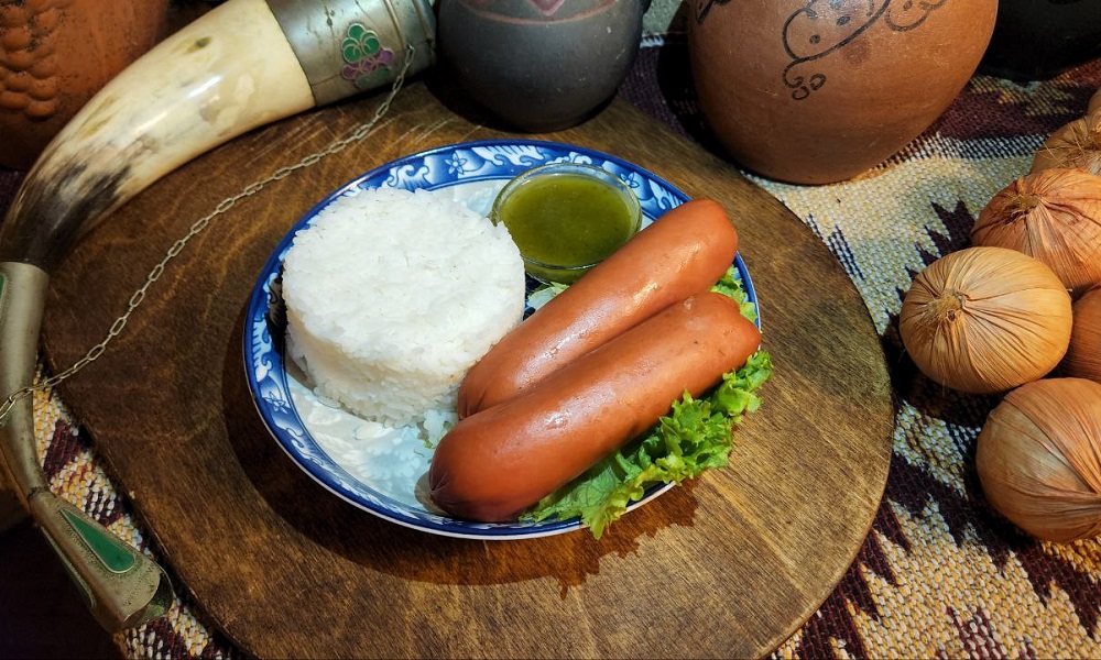 Sardel With Rice Garnish - Georgian dish at Tbilisuri Ezo restaurant in Tbilisi }}
