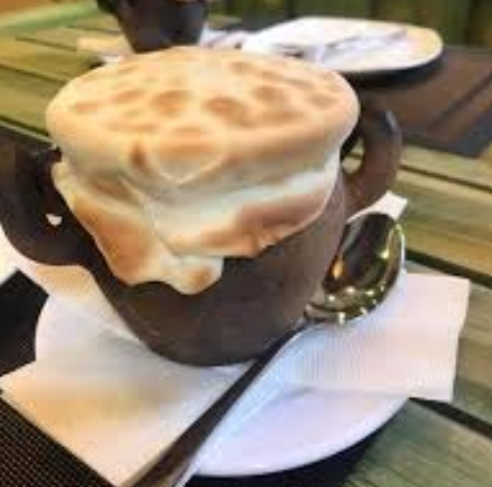 Dumplings in a pot at Tbilisuri Ezo Georgian restaurant in Tbilisi }}