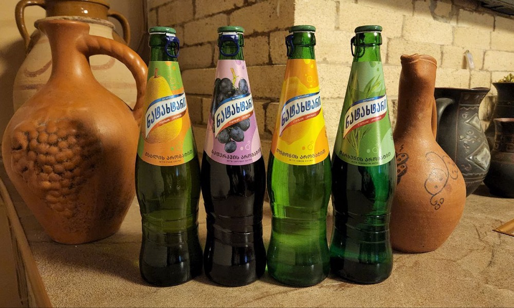 Lemonade Natakhtar 0.5 L (grape) - Georgian dish at Tbilisuri Ezo restaurant in Tbilisi }}
