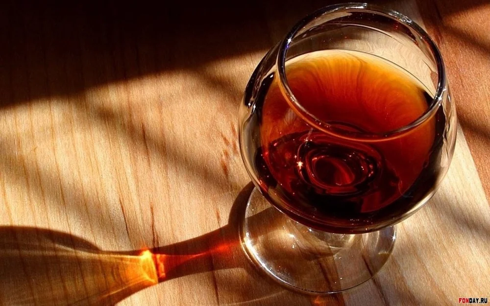 A glass of cognac at Tbilisuri Ezo Georgian restaurant in Tbilisi }}